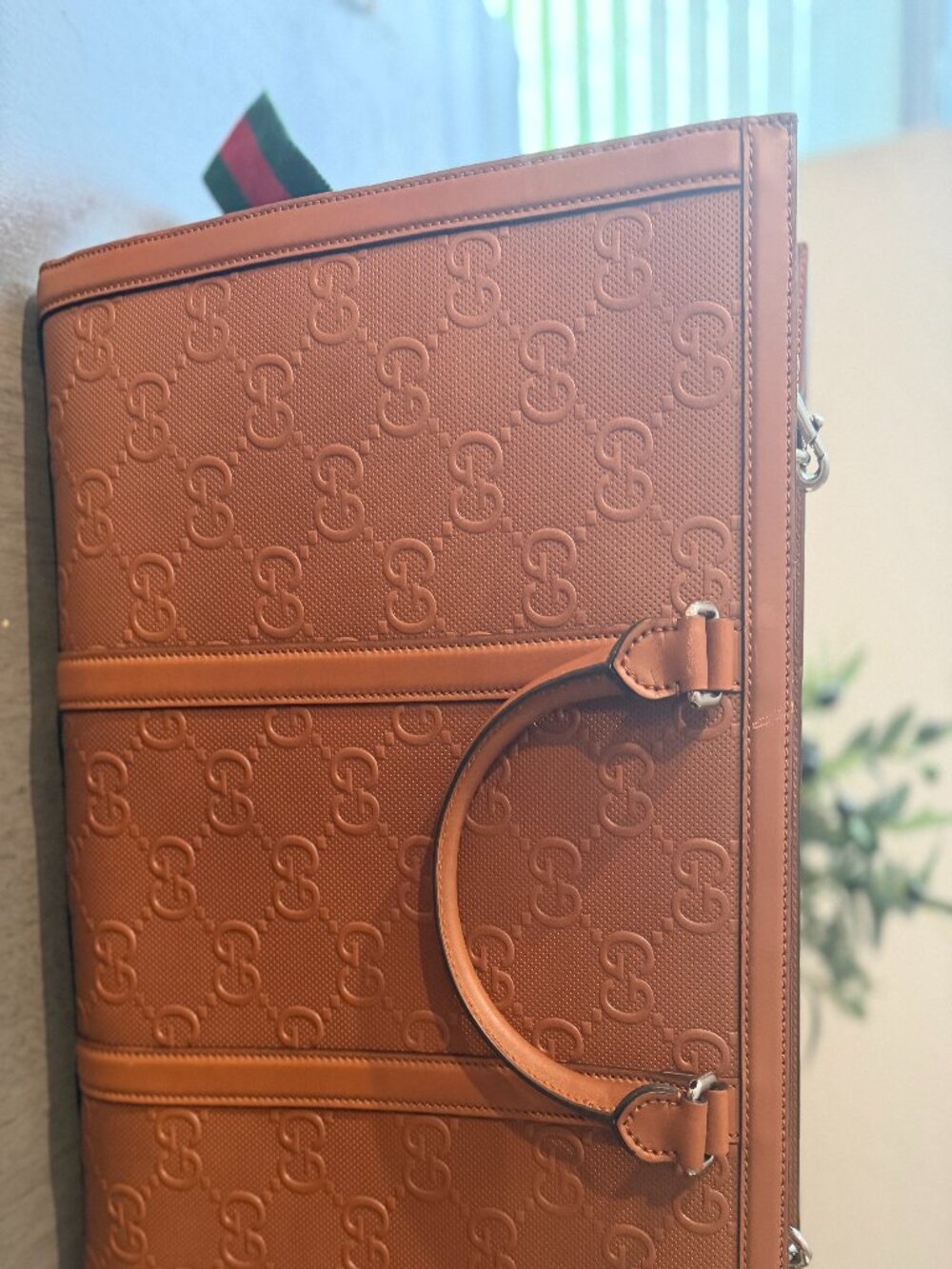 Brown Gucci GG Embossed Leather Tote